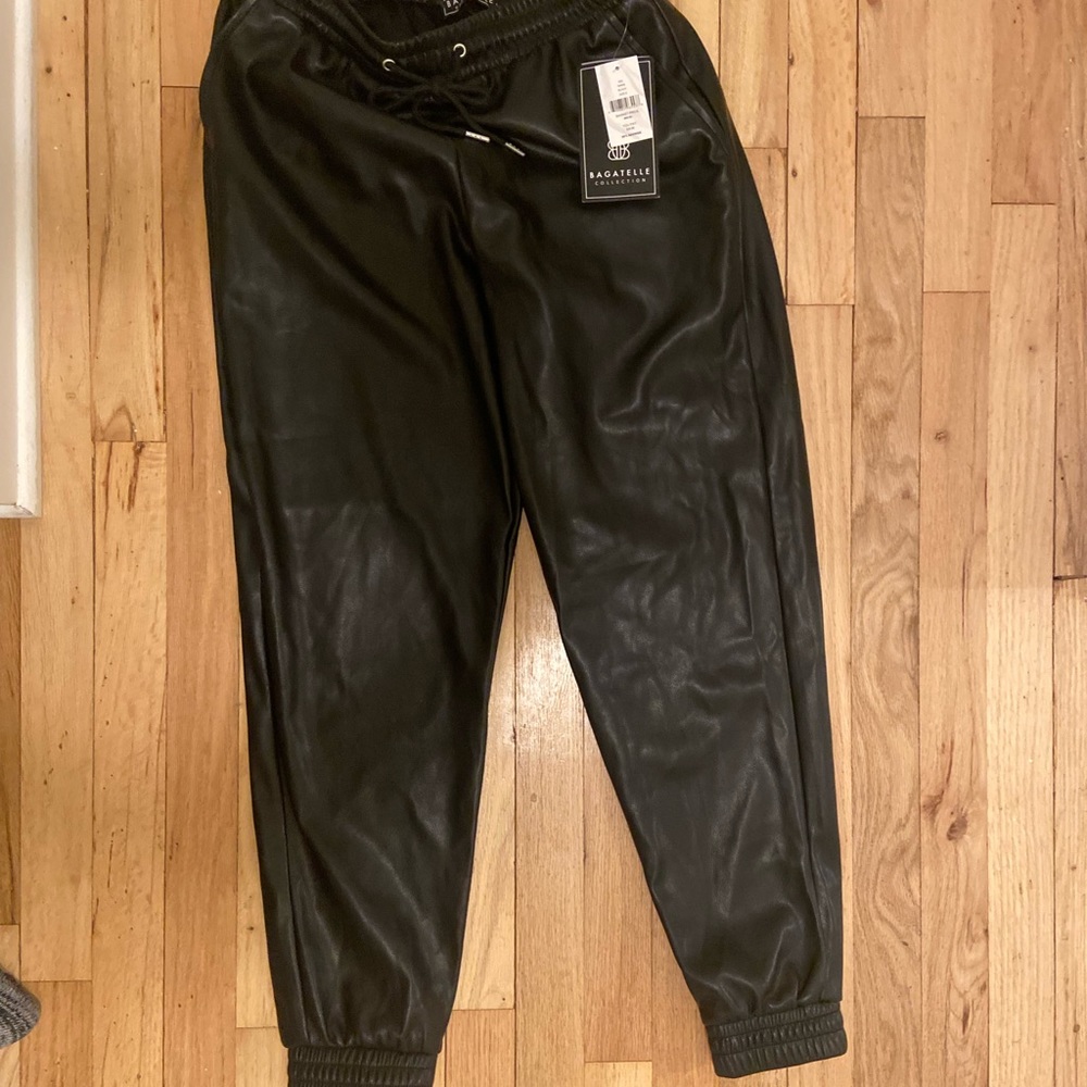Black faux leather joggers size small with tags.